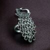 Oxidized adjustable silver replica peacock design ring with detailed.