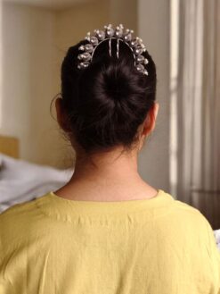 Traditional oxidized juda pin with pearl and stone detailing.