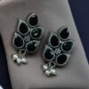 German silver lotus earrings with stone and pearl work.