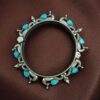 Oxidized silver replica peacock design openable bangle with stone and pearl work
