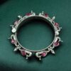 Oxidized silver replica peacock design openable bangle with stone and pearl work