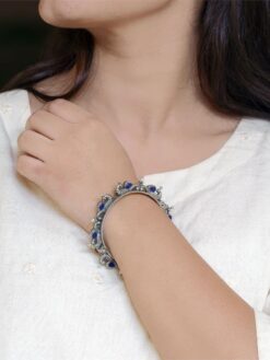 Oxidized silver replica peacock design bangle with stone and pearl work