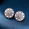 Stone detailing silver plated German silver stud earrings