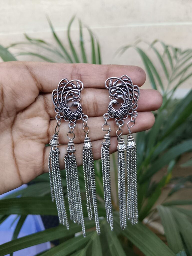 Peacock Design German Silver Dangler Earrings with Elegant Hanging Chain Detail