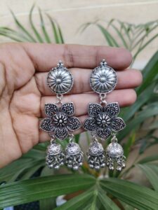 Floral Art German Silver Hanging Jhumka Earrings with Elegant Pearl Work
