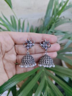 Silver Plated Floral Art Jhumka Earrings with Beautiful Stone and Pearl Work Design