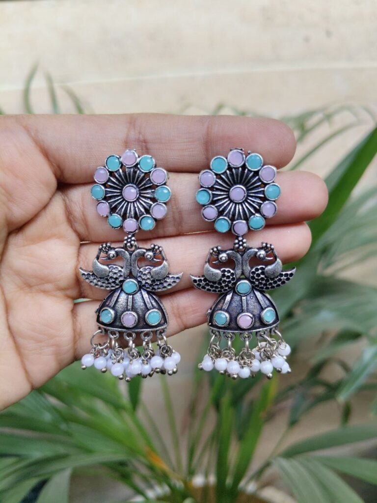 Graceful Peacock Design Silver Plated Dangler Earrings with Stone and Pearl Work