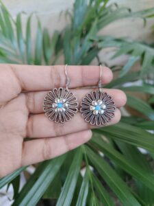 Elegant Floral Art German Silver Hook Earrings with Detailed Stone Work