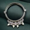 Traditional silver look openable bangle with stone pearl work