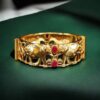 Handcrafted elephant design gold plated stone work bangle
