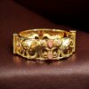 Handcrafted elephant design gold plated stone work bangle