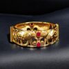 Handcrafted elephant design gold plated stone work bangle