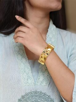 Handcrafted elephant bangle gold plated stone work