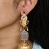 Beautiful gold plated jhumka earrings with pearl and stone work