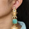 Beautiful gold plated jhumka earrings with pearl and stone work