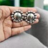 Oxidized silver plated flower design stud earrings