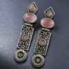 Oxidized silver replica dangler earrings with Monalisa stone