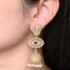 Gold plated jhumka dangler earrings with stone and pearl work