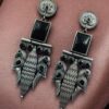 Oxidized silver replica peacock dangler earrings with stone work