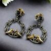 Two-tone bird earrings design dangler with flower stone work