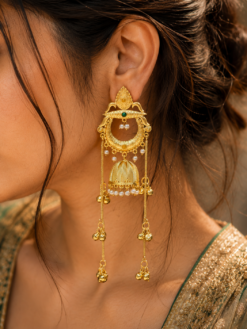 Royal gold plated Kashmiri jhumka earrings with intricate stone detailing and elegant pearl work, traditional Indian bridal and festive jewelry design