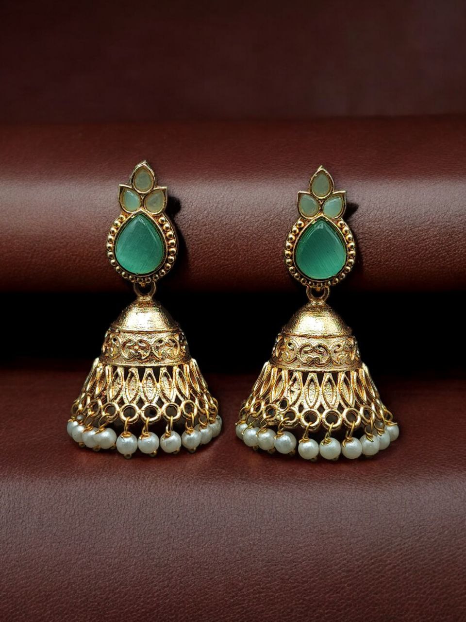 Luxurious Gold Plated Jhumka Earrings with Sparkling Stone Pearl Work 3 Luxurious gold plated jhumka earrings with sparkling stone embellishments and elegant pearl work, traditional Indian ethnic jewelry