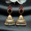 Luxurious gold plated jhumka earrings with sparkling stone embellishments and elegant pearl work, traditional Indian ethnic jewelry