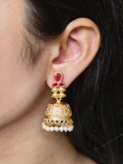 Gold plated jhumka dangler earrings with stone and pearl work