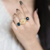 Gold plated adjustable ring with Monalisa stone and pearl work