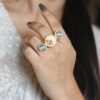 Gold plated adjustable ring with Monalisa stone and pearl work