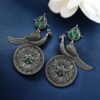 Antique peacock earrings for women with intricate stone work and silver-plated finish