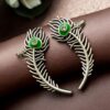Silver replica meenakari peacock feather earcuff with intricate ethnic detailing and traditional statement jewelry design