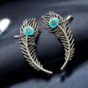 Silver Replica Meenakari Peacock Feather Earcuff | Traditional Ethnic Statement Jewelry 10 Silver replica meenakari peacock feather earcuff with intricate ethnic detailing and traditional statement jewelry design