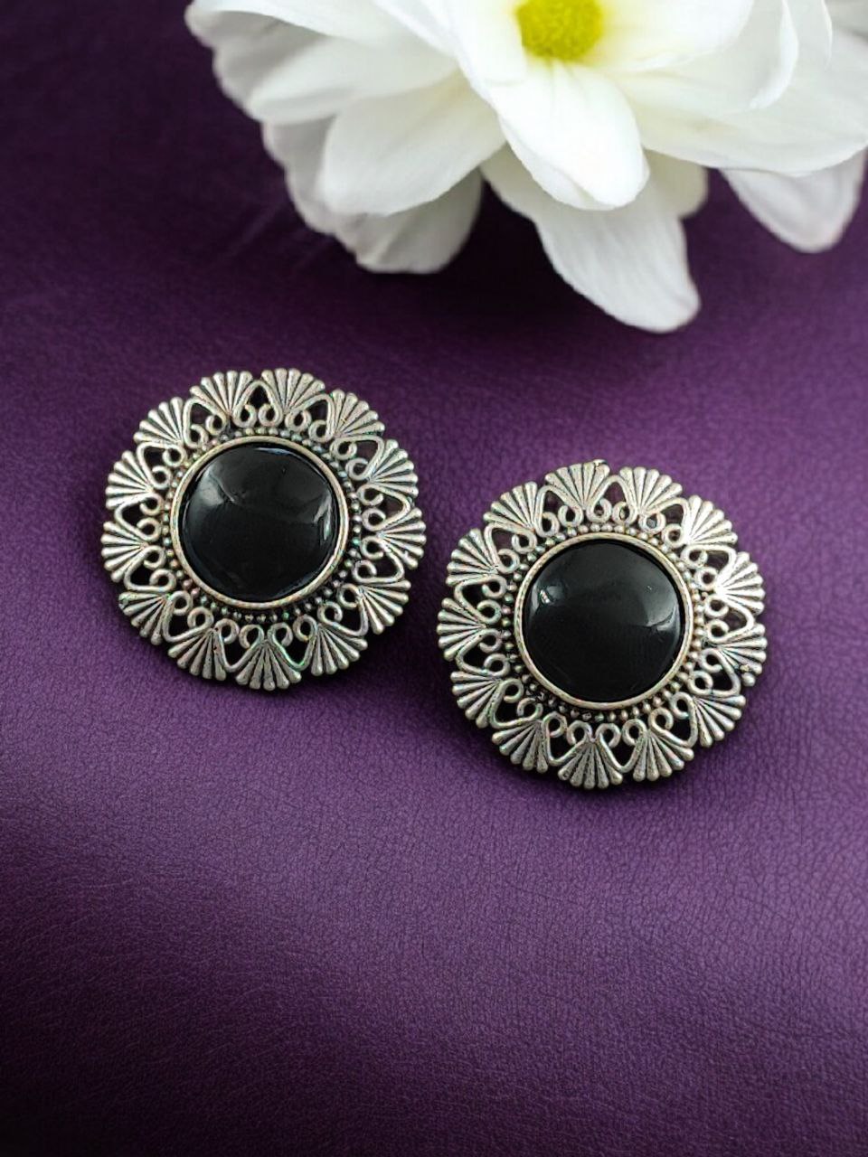 Antique Inspired Silver Replica Floral Art Statement Stud Earrings 4 Antique inspired silver replica floral art statement stud earrings with intricate carved detailing and oxidized finish for traditional and festive wear.