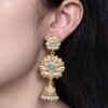Gold plated flower design jhumka earrings with stone and pearl work