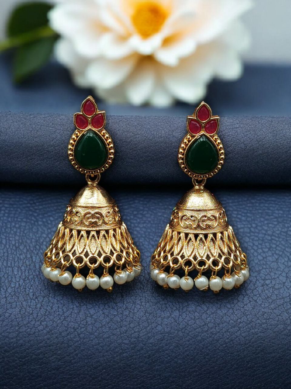 Luxurious Gold Plated Jhumka Earrings with Sparkling Stone Pearl Work 11 Luxurious gold plated jhumka earrings with sparkling stone embellishments and elegant pearl work, traditional Indian ethnic jewelry