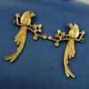 Gold plated parrot stud earrings with flower design and stone work