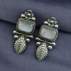 Silver replica leaf design stud earrings with Monalisa stone