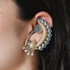 Two-tone peacock earcuff with stone and pearl work