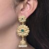 Gold plated flower design jhumka earrings with stone and pearl work