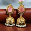 Gold plated jhumka earrings with stone and pearl work