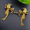 Gold plated parrot stud earrings with flower design and stone work