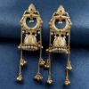 Royal gold plated Kashmiri jhumka earrings with intricate stone detailing and elegant pearl work, traditional Indian bridal and festive jewelry design