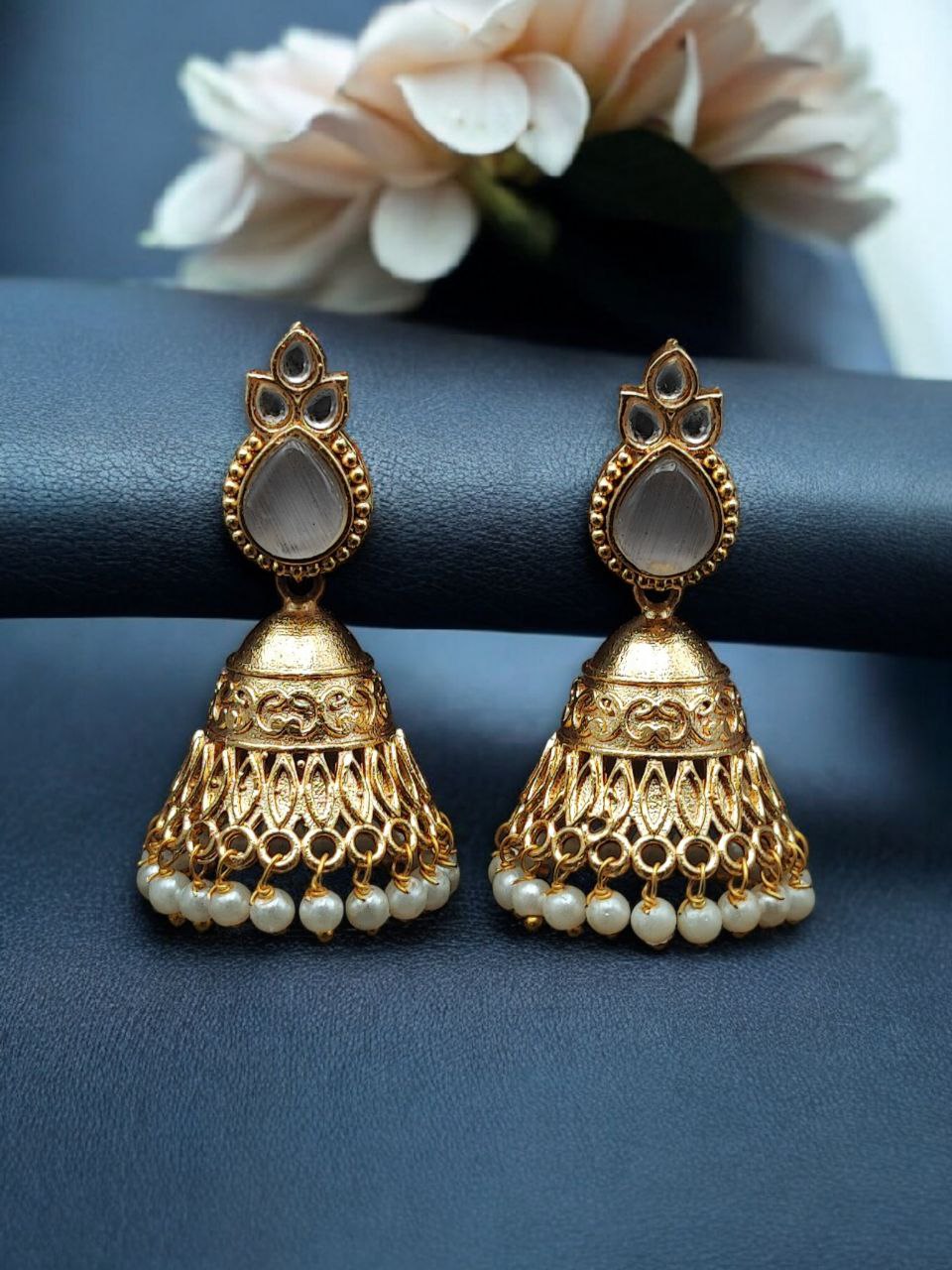 Luxurious Gold Plated Jhumka Earrings with Sparkling Stone Pearl Work 5 Luxurious gold plated jhumka earrings with sparkling stone embellishments and elegant pearl work, traditional Indian ethnic jewelry