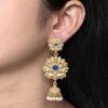 Gold plated flower design jhumka earrings with stone and pearl work