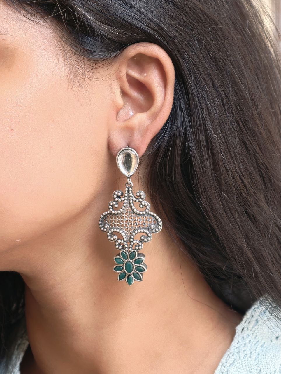 Stunning Silver Flower Dangler with Elegant Ethnic Appeal 9 Elegant Silver Flower Dangler with detailed floral design