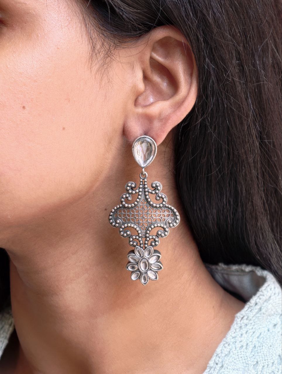Stunning Silver Flower Dangler with Elegant Ethnic Appeal 5 Elegant Silver Flower Dangler with detailed floral design