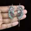 Graceful Ethnic Peacock Earcuff with Exquisite Traditional Detailing 12 Ethnic Peacock Earcuff brass traditional ear jewelry for festive occasions