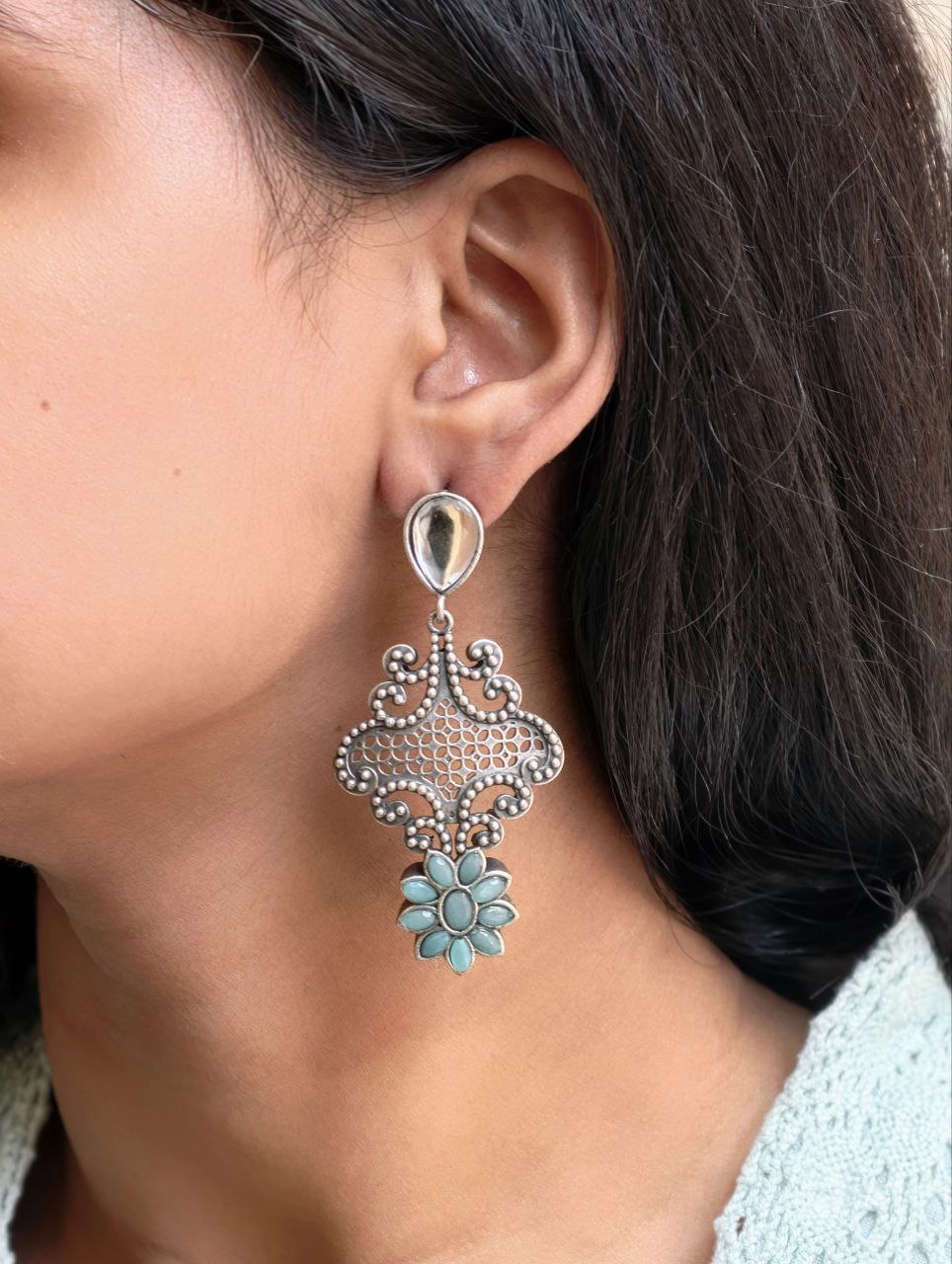 Stunning Silver Flower Dangler with Elegant Ethnic Appeal 2 Elegant Silver Flower Dangler with detailed floral design