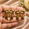 Anti Tarnish Bow Stud Earring with premium gold-plated finish for women